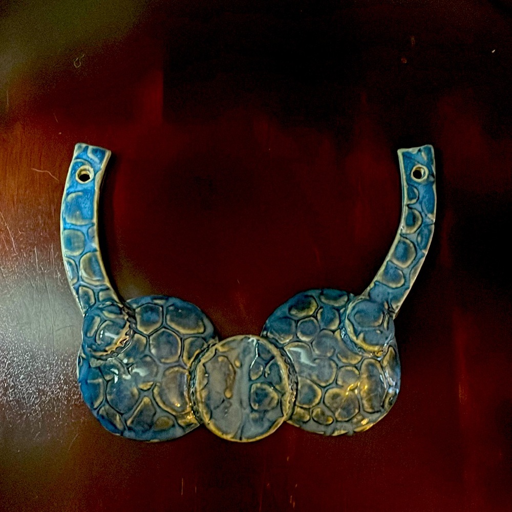 Bikini top wall ornament.